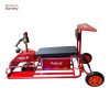 A mini e scooter from Vietnam in red colors, three seaters